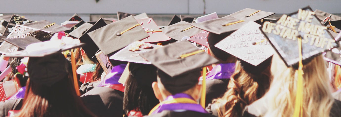 young-college-high-school-graduates-at-graduation-2023-11-27-05-02-12-utc
