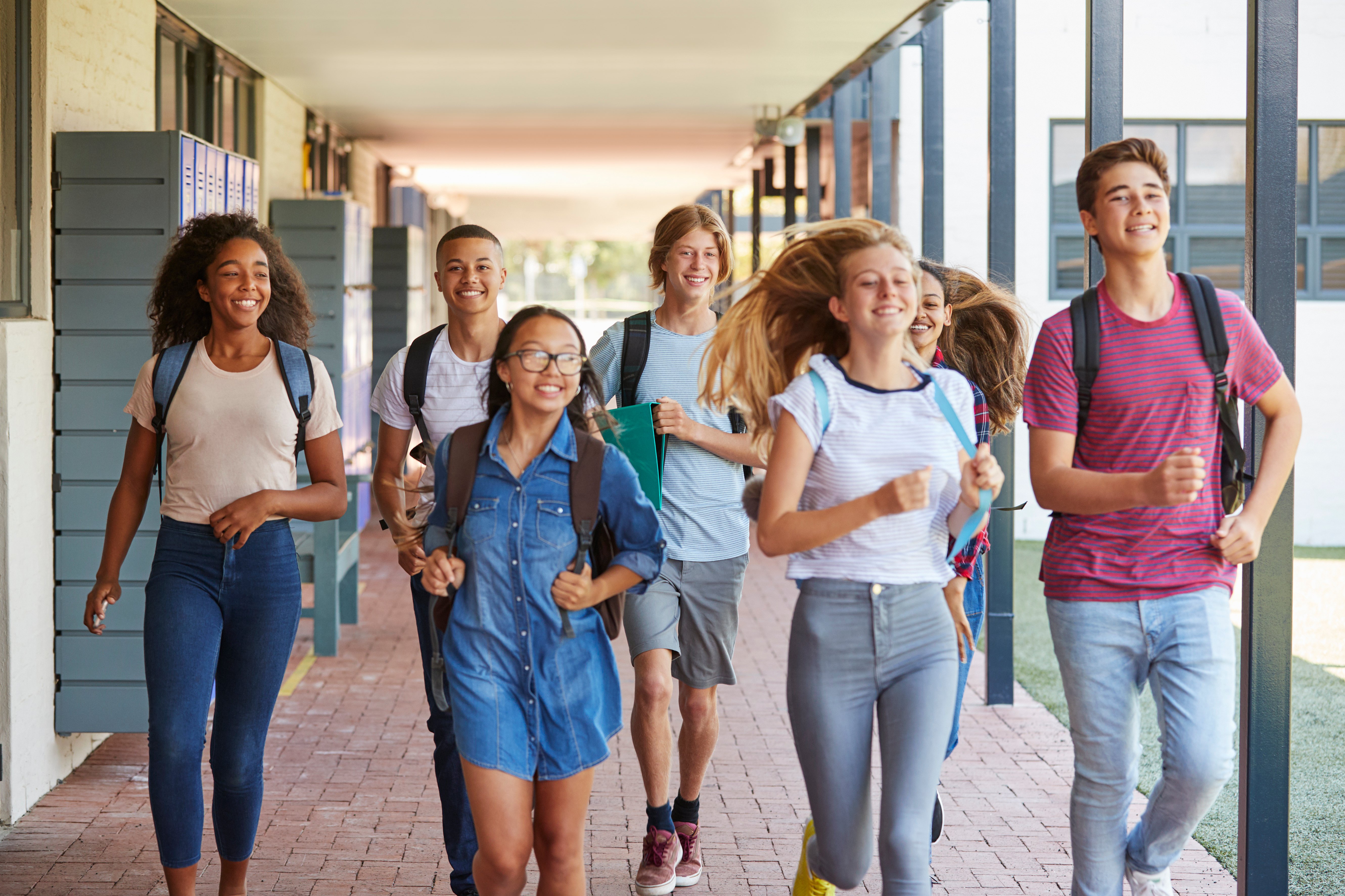 teenager-school-kids-running-in-high-school-hallwa-2023-11-27-05-27-59-utc-1